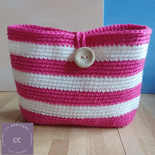 Trousse de toilette fuchsia et blanche