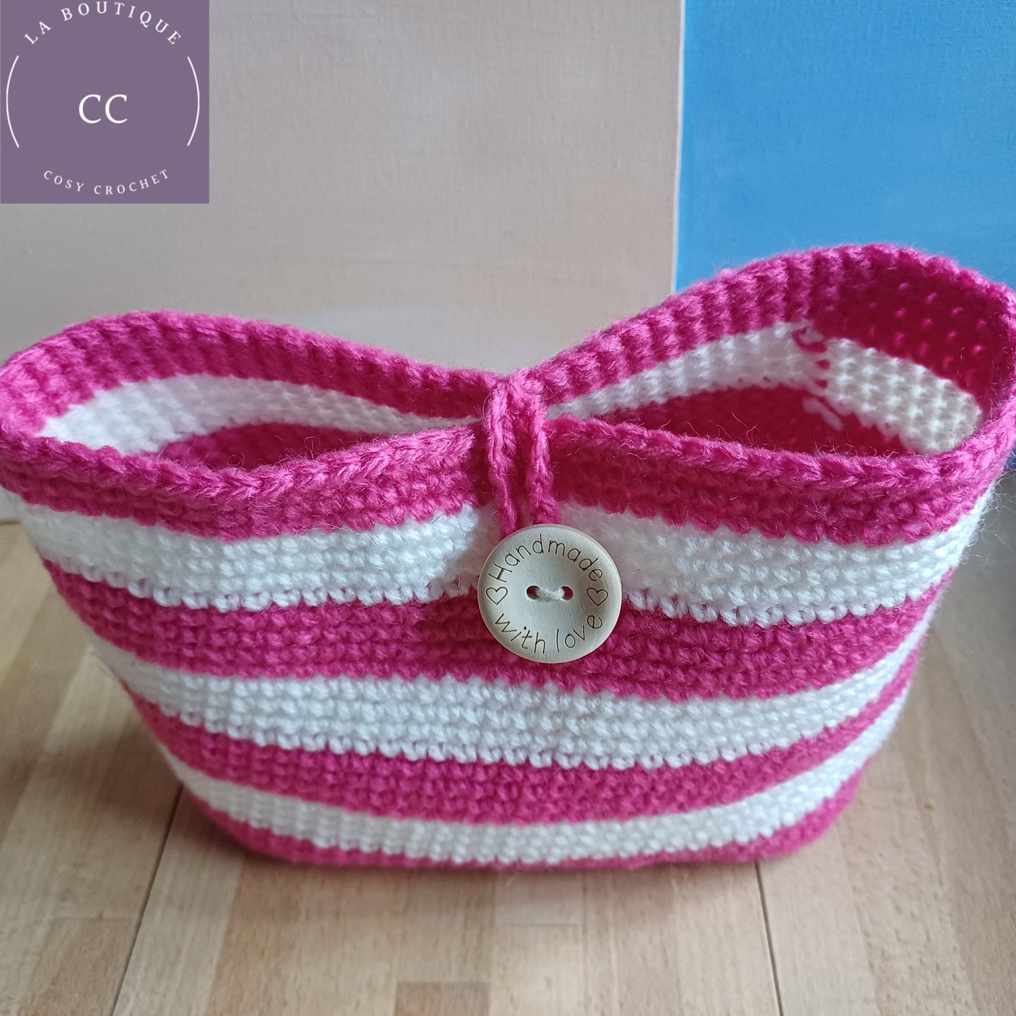 Trousse de toilette fuchsia et blanche